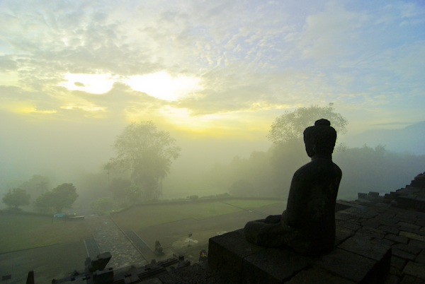 Buddha looking out from Borobudur